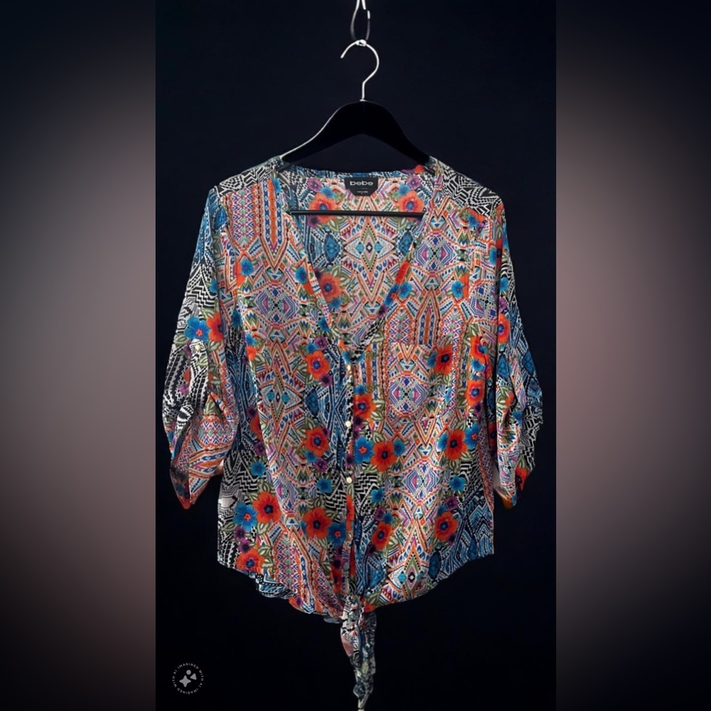 Gold Detailed buttons on sleeve and down the middle. Polyester material